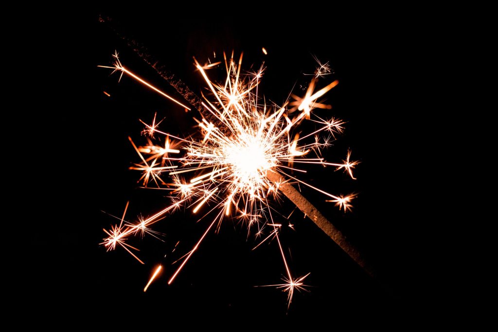 Spark picture of sparkler on dark background